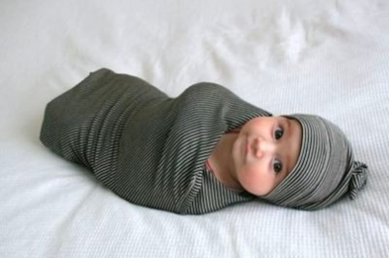 قماط الطفل: ما فوائده، ومتى يجب إيقافه؟