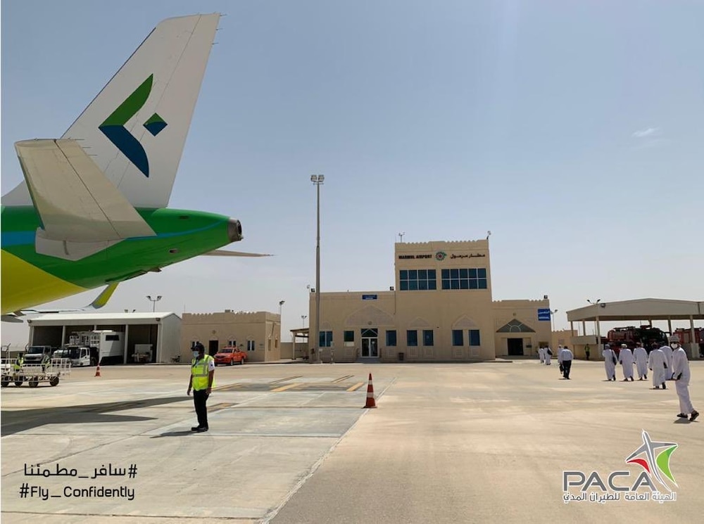 بالصور: رحلة جوية من مطار مسقط إلى مرمول وقرن علم